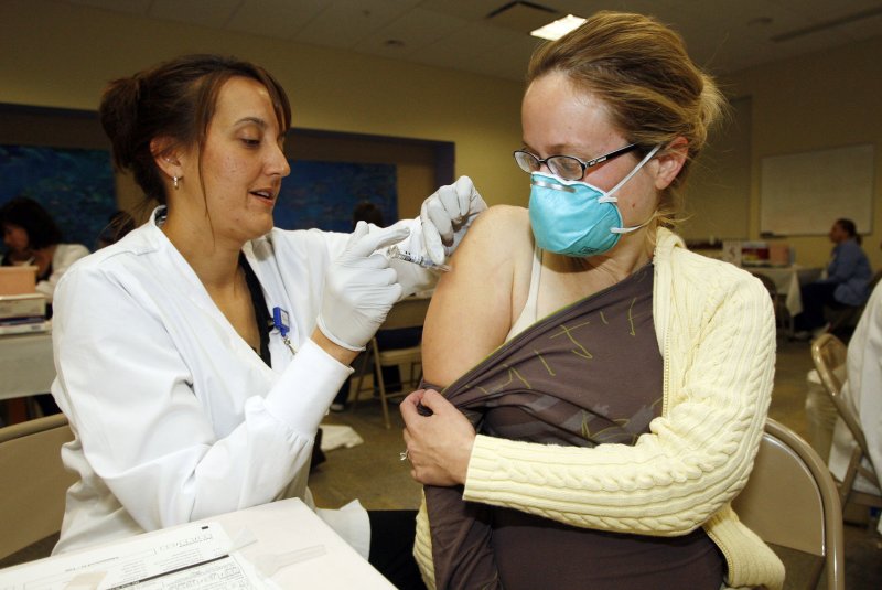 Researchers found a link between reduced rates of whooping cough in newborns under 2 months of age and Tdap (tetanus, diphtheria, pertussis) vaccination during pregnancy. File Photo by Bill Greenblatt/UPI