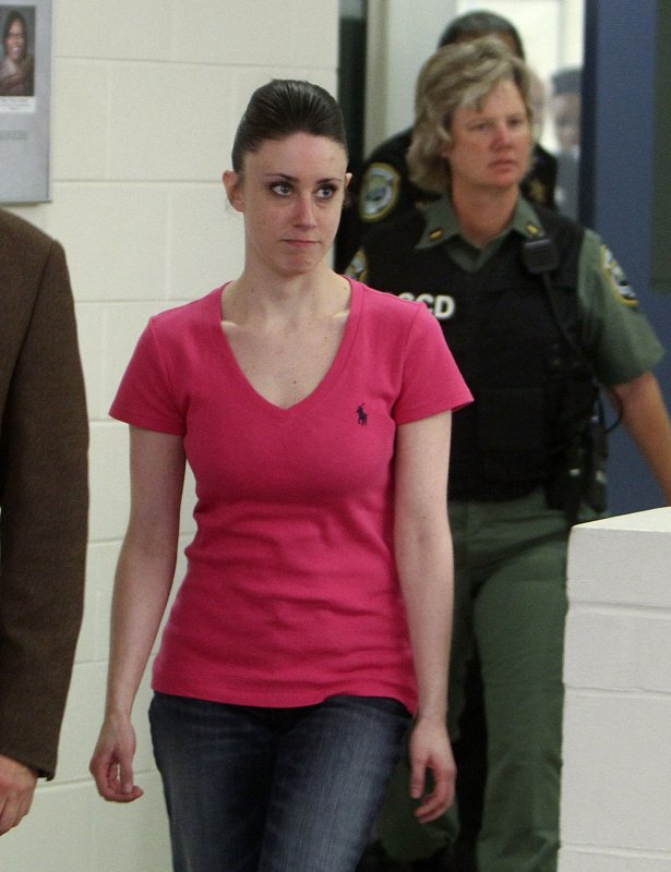 Casey Anthony walks out of the the Orange County Jail after being released at 12:08 am July 17, 2011 in Orlando, Florida. Anthony was acquitted in the death of her daughter, Caylee. UPI/Red Huber/Pool