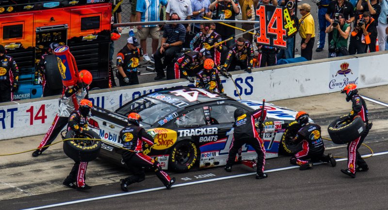 Tony Stewart receives service from his crew at the Indianapolis Motor Speedway on July 26, 2015. Stewart criticized NASCAR for its lack of a lug nut policy and for being lax on safety. Photo by Ed Locke/UPI