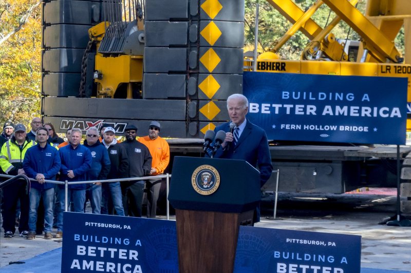 President Joe Biden speaks on the importance of infrastructure funding at the site of the rebuilding of the Fern Hollow Bridge on October 20 in Pittsburgh. The bridge collapsed on January 28. File Photo by Archie Carpenter/UPI