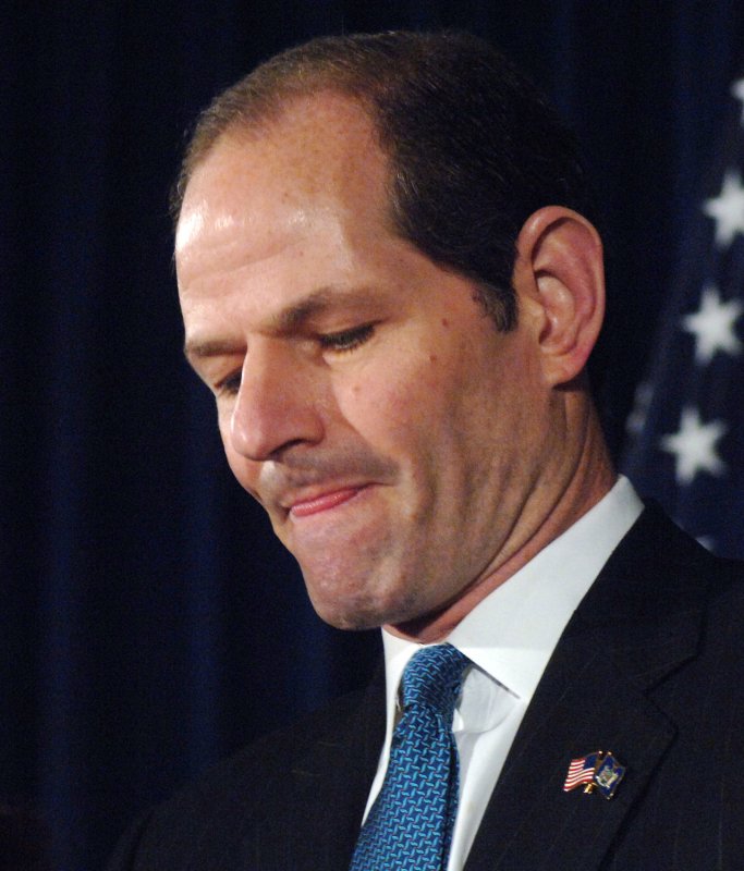 Eliot Spitzer, former New York State governor, seen here announcing his resignation in 2008, is under investigation for an incident Saturday in which he allegedly pushed and attempted to choke a woman in New York's Plaza Hotel. File Photo by Ezio Petersen/UPI