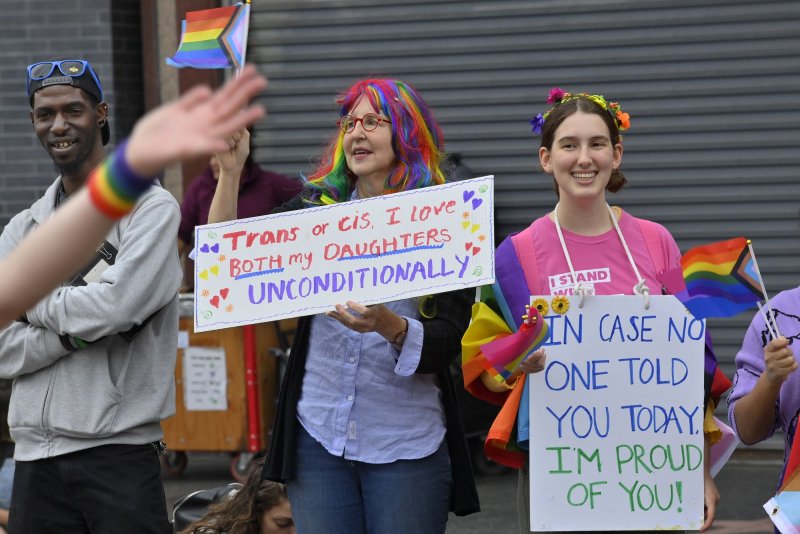 L.A. Pride parade watchers cheer on participants along Hollywood Boulevard in June. A report released Monday says at least 33 transgender and gender non-conforming people have been killed in the United States during past 12 months. File Photo by Jim Ruymen/UPI