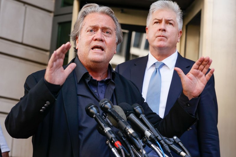 Steve Bannon, former adviser to Donald Trump, speaks to the media Tuesday as his attorney Matthew Evan Corcoran looks on following opening statements at the first day of his contempt of Congress trial at the U.S. Federal Court in Washington, D.C. Photo by Jemal Countess/UPI