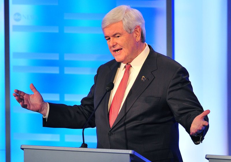 U.S. presidential hopeful Newt Gingrich threatened to sue TV stations airing ads by a group backing Mitt Romney claiming he was fined for ethics violations. Pictured last Saturday. UPI/Kevin Dietsch