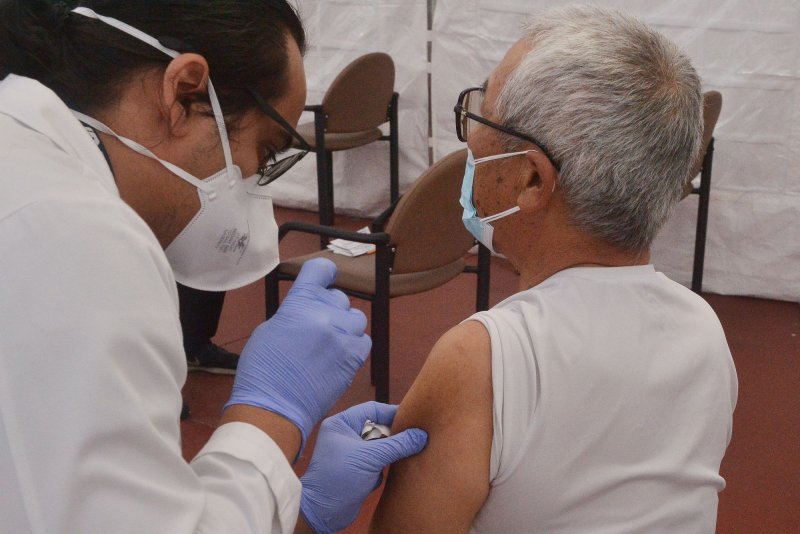 COVID-19 is especially dangerous for older people, even if they are vaccinated (like those in L.A. in 2020, pictured). Despite the risks, though, an assisted-care facility in Los Angeles is accused of taking in a patient from New York City in March 2020 without testing them for COVID-19. New York City healthcare facilities were in the throes of a rampant COVID-19 outbreak at the time. File Photo by Jim Ruymen/UPI