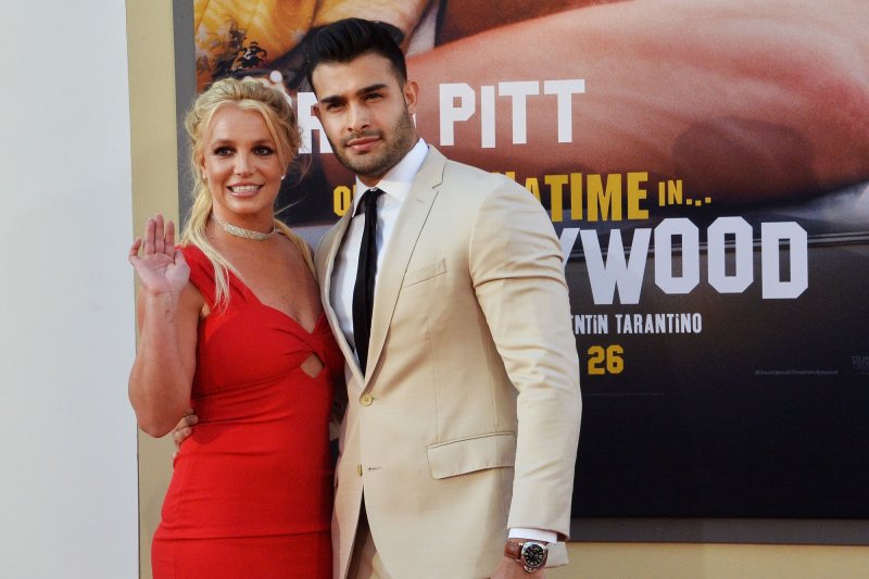 Britney Spears (L), pictured with Sam Asghari, discussed her "abusive" 13-year conservatorship in a phone call to a judge Wednesday. File Photo by Jim Ruymen/UPI | <a href="/News_Photos/lp/b5f830527d3955482d43258042aeb3f6/" target="_blank">License Photo</a>