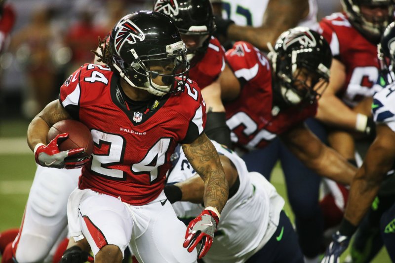 Former Atlanta Falcons running back Devonta Freeman (24), shown Jan. 14, 2017, joins Ty'Son Williams and Latavius Murray in the Baltimore Ravens' backfield. File Photo by Phil Skinner/UPI | <a href="/News_Photos/lp/394e549157a5669d661a4e2d0b143665/" target="_blank">License Photo</a>
