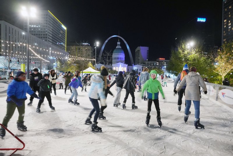 Skaters enjoy the first night of downtown skating near the Gateway Arch as Christmas holiday celebrations are underway in Kiener Plaza in St. Louis on Saturday. The 75th lighting of the Salvation Army Christmas was also held. Photo by Bill Greenblatt/UPI