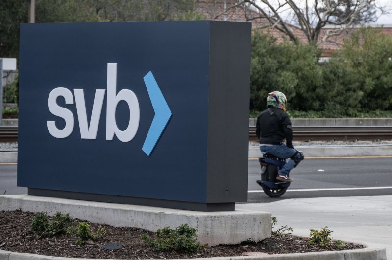 A motorist passes the entrance of the Silicon Valley Bank in Santa Clara, California on Saturday. Silicon Valley Bank parent SVB Financial filed for Chapter 11 bankruptcy on Friday. Photo by Terry Schmitt/UPI