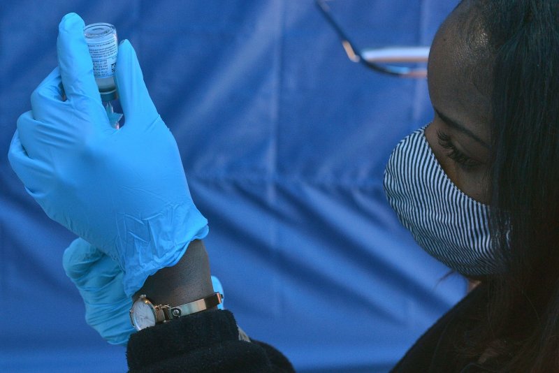 A medical professional prepares a dose of coronavirus vaccine for residents at the Kedren Community Health Center in South Los Angeles, Calif., on February 16. Photo by Jim Ruymen/UPI
