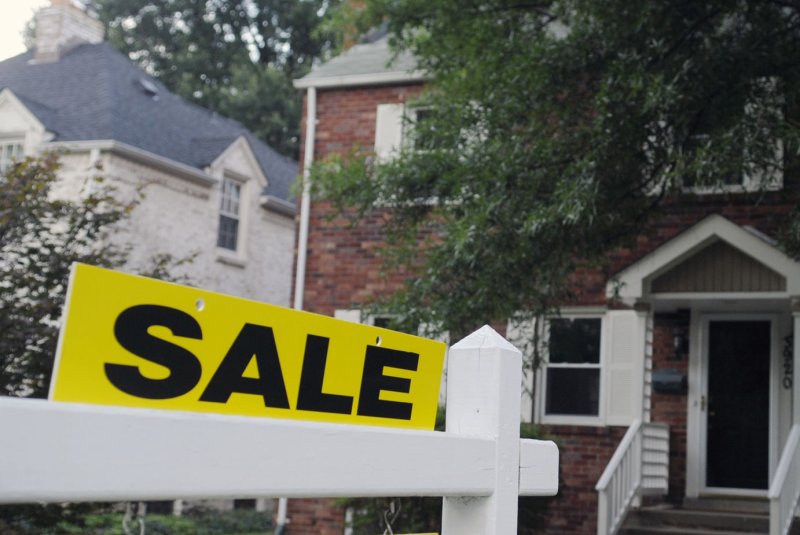 The average rate for 30-year fixed-rate mortgages under $647,200 slid last week from 5.98% to 5.84%, Wednesday's industry report said. File Photo by Alexis C. Glenn/UPI | <a href="/News_Photos/lp/3788b35fa78d0da8da0f8f4b95650d9f/" target="_blank">License Photo</a>