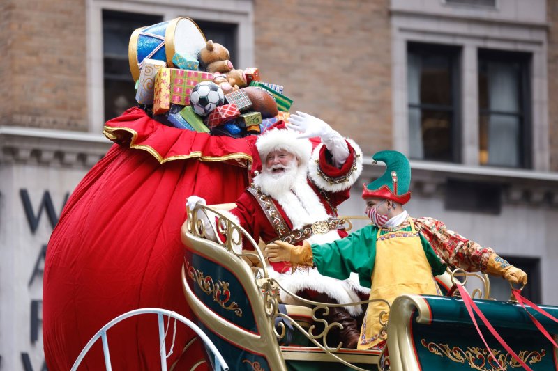 Santa Claus and his elves move down the parade route at the 95th Macy's Thanksgiving Day Parade in New York City on Thursday.&nbsp; Photo by John Angelillo/UPI