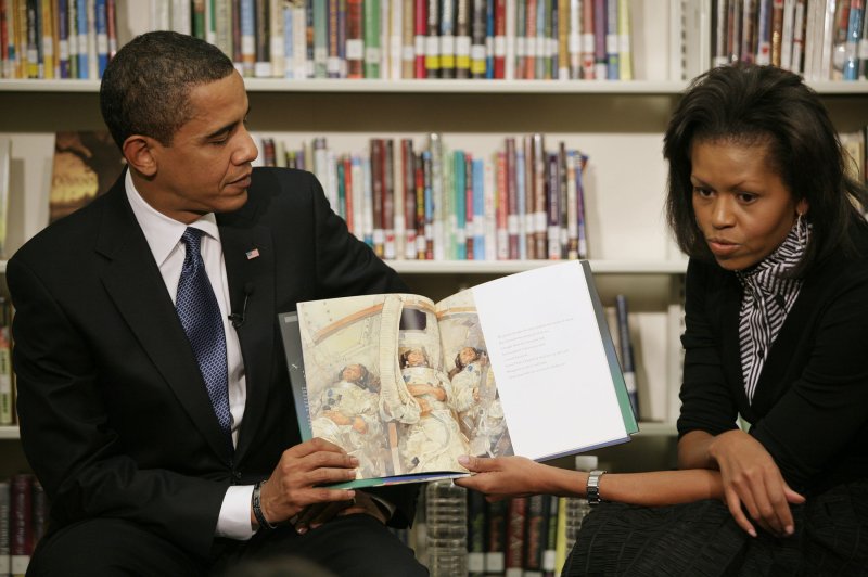 U.S. President Barack Obama and First Lady Michelle Obama read to second graders. (UPI Photo/Gary Fabiano/Pool) | <a href="/News_Photos/lp/fd8efa0998fb27e42bdcea972705a0c5/" target="_blank">License Photo</a>