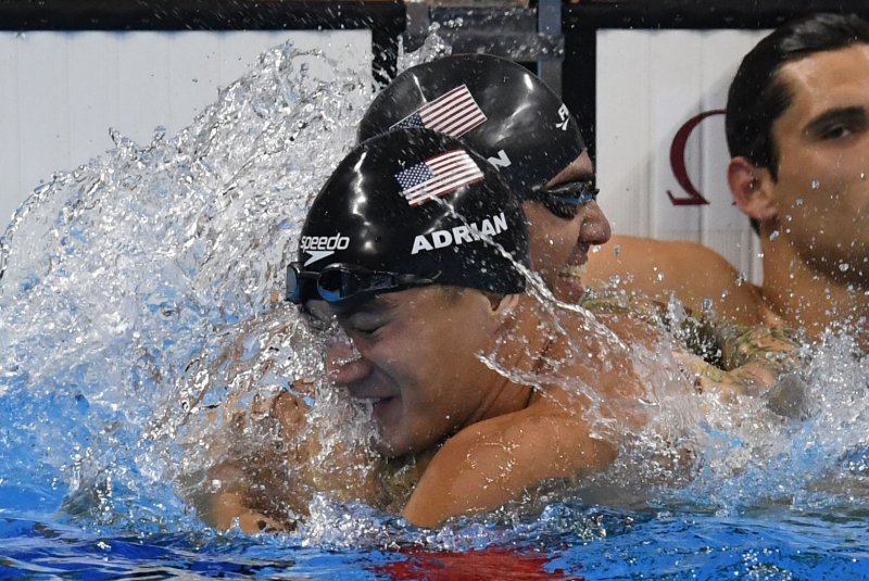 Nathan Adrian (C) announced he was diagnosed with cancer on Thursday. He hopes to return after a few weeks of treatment to prepare for the 2020 Games in Tokyo. File photo by Richard Ellis/UPI