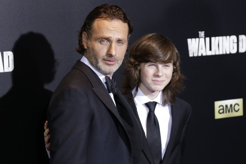 Andrew Lincoln and Chandler Riggs arrive on the red carpet at AMC's 'The Walking Dead' Season 6 fan premiere event on October 9, 2015 in New York City. File Photo by John Angelillo/UPI