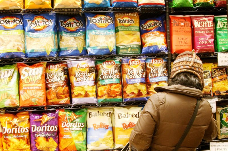 A new study finds increased consumption of ultra-processed foods, like packaged chips, may be linked to a higher risk of developing and dying from cancer. File photo by Monika Graff/UPI