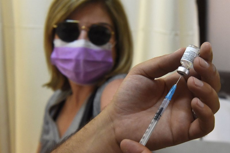 Experts say COVID-19 vaccine booster shots, in the United States and elsewhere, should not be considered until more of the world has received initial doses because that would go farther to slow down global coronavirus spread and potentially prevent the next deadly variant. File Photo by Debbie Hill/UPI