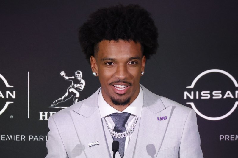 LSU quarterback Jayden Daniels speaks at a press conference after he wins the 2023 Heisman Trophy Award at the Marriott Marquis in New York City on Saturday, Photo by John Angelillo/UPI