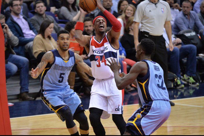 Washington Wizards forward Paul Pierce shoots for two against Memphis Grizzlies guard Courtney Lee (5) and Jeff Green (32) during the third quarter at the Verizon Center in Washington, D.C. on March 12, 2015. Photo by Kevin Dietsch/UPI