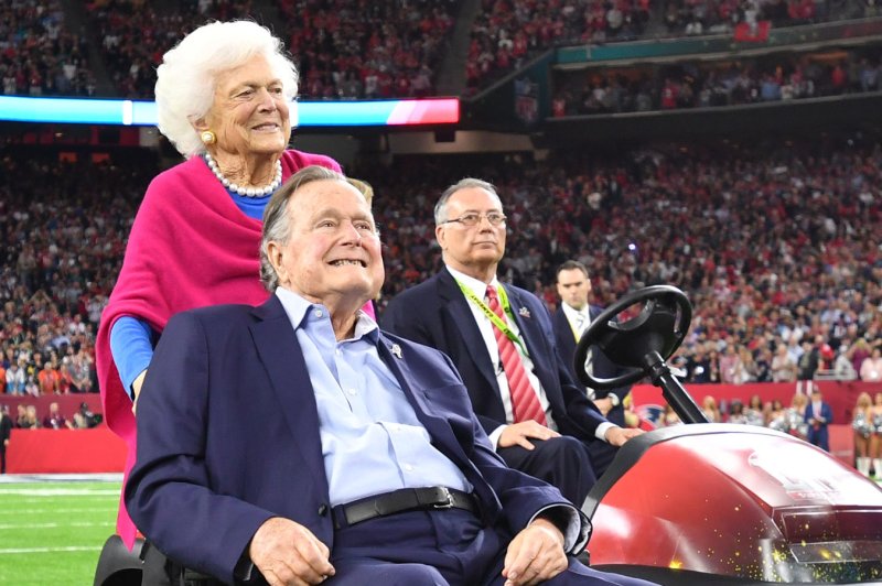 Former President George H.W. Bush and wife Barbara attend the coin toss at Super Bowl LI at NRG Stadium in Houston on February 5. Both were hospitalized a couple weeks earlier with pneumonia and viral bronchitis. Photo by Kevin Dietsch/UPI