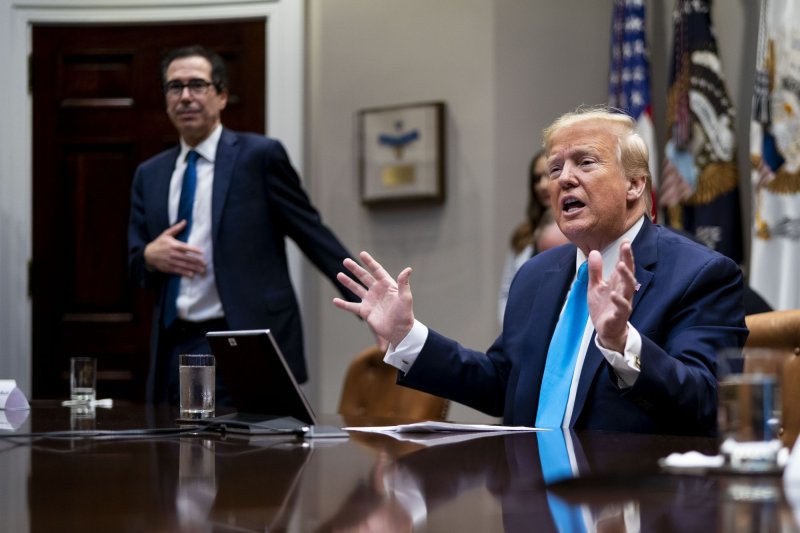 President Donald Trump makes remarks with Treasury Secretary Steve Mnuchin during a Small Business Relief Update at the White House in Washington on Tuesday. Pool photo by Doug Mills/UPI | <a href="/News_Photos/lp/6487b0e26cf6771786a9f65c8c0a0ed0/" target="_blank">License Photo</a>