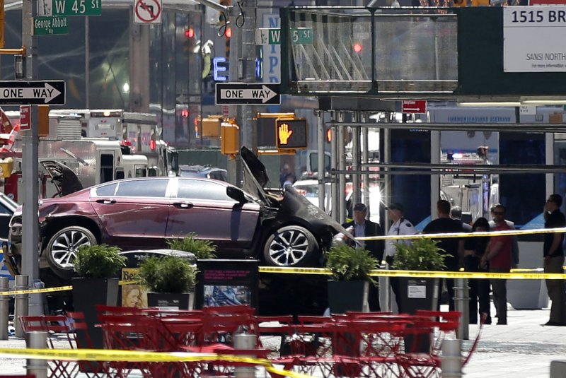 Police surround the area and close down streets in Times Square after a car rams into pedestrians in New York City on May 18, 2017. The trial for the man who drove through crowds of tourists in Times Square killing one woman and injuring 22 other people has started in a state court in New York City nearly five years after his arrest. File Photo by John Angelillo/UPI | <a href="/News_Photos/lp/ca9eece7afb12ef840678b939a9b5c35/" target="_blank">License Photo</a>