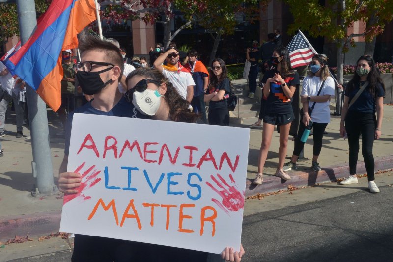 Several hundred demonstrators rally outside the Azerbaijani Consulate General offices in protest over the conflict between Armenia and Azerbaijan in Los Angeles on November 1, 2020. Researchers accuse the NSO Group of using military-grade spyware against Armenia and others. File Photo by Jim Ruymen/UPI