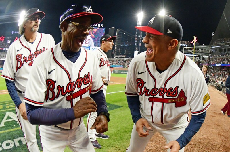 Veteran third base coach Ron Washington (C), who won a World Series with the Atlanta Braves in 2021, was hired Wednesday to serve as manager of the Los Angeles Angels. File Photo by Scott Cunningham/UPI