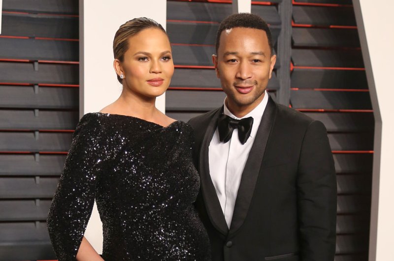 Chrissy Teigen and John Legend attend the 2016 Vanity Fair Oscar Party on February 28, 2016. Teigen shared the first photo of their newborn daughter Luna on Instagram. File Photo by David Silpa/UPI