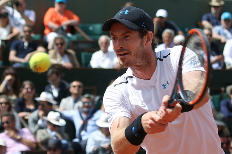 Andy Murray of the United Kingdom hits a shot during his French Open men's semifinal match against Stan Wawrinka of Switzerland at Roland Garros in Paris on June 9, 2017. File photo by David Silpa/UPI | <a href="/News_Photos/lp/162885a6fbddc3686df74332c4da7b24/" target="_blank">License Photo</a>
