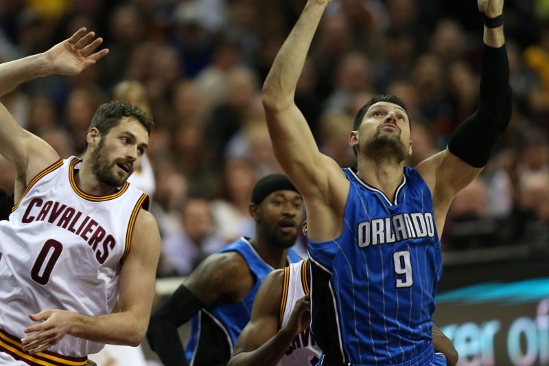 Orlando Magic center Nikola Vucevic (R) is averaging a career-best 24.5 points and 11.8 rebounds this season. File Photo by Aaron Josefczyk/UPI