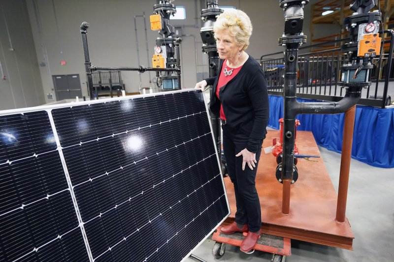 U.S. General Services Administrator Robin Carnahan gets a closer look at a solar panel in Earth City, Mo., in March. File Photo by Bill Greenblatt/UPI