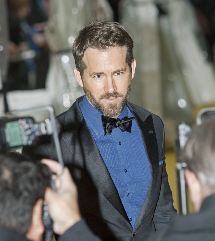 Actor Ryan Reynolds arrives on the Yellow Carpet where he will be inducted into the 2014 Canada's Walk of Fame during ceremonies at The Sony Centre for the Performing Arts in Toronto, Ontario October 18, 2014. Photo by Heinz Ruckemann/UPI | <a href="/News_Photos/lp/b6866f99be39abb41c742cea3c89d99d/" target="_blank">License Photo</a>