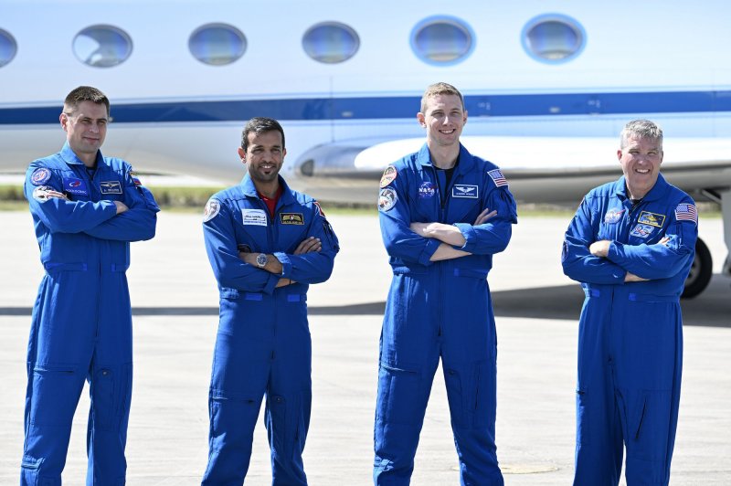 Russian Cosmonaut Andrey Fedyaev, UAE Astronaut Sultan Al Neyadi and NASA Astronauts Stephen Bowen and Warren Hoburg pose for the media after arriving at the Kennedy Space Center, Florida on Tuesday. Their flight was postponed until Monday. Photo by Joe Marino/UPI