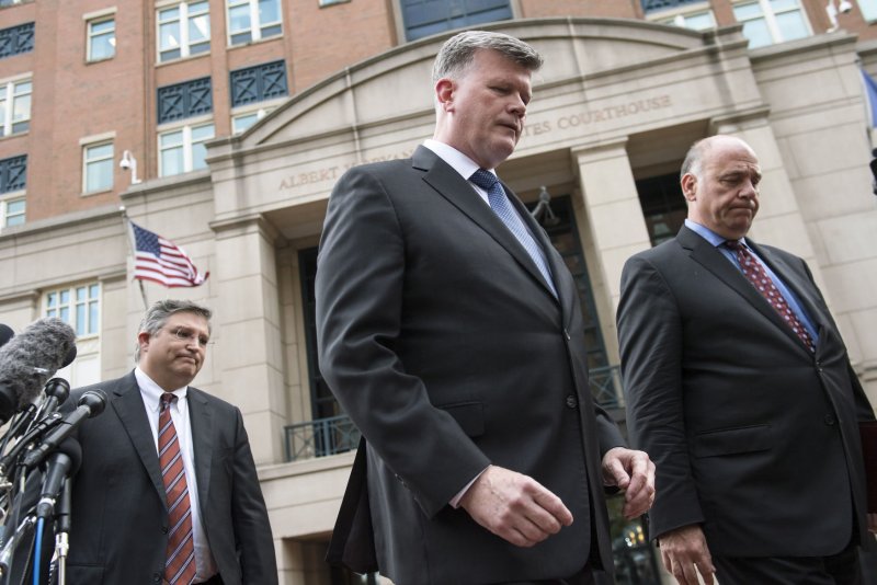 Kevin Downing (C), Richard Westling (L) and Thomas Zehnle, attorneys for former Trump campaign chairman Paul Manafort, leave Tuesday after he was found guilty on 8 of 10 charges in his fraud case, at the Albert V. Bryan U.S. Courthouse in Alexandria, Virginia. Photo by Kevin Dietsch/UPI