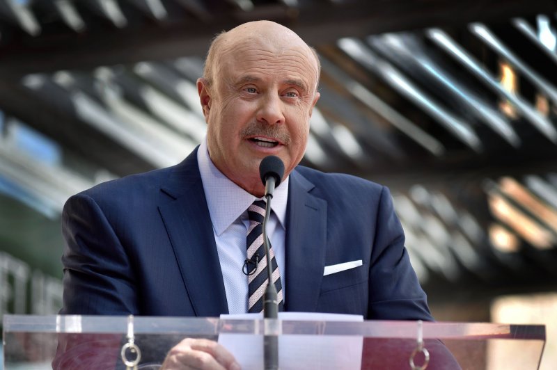 Dr. Phil McGraw attends the star unveiling ceremony honoring him with the 2,688th star on the Hollywood Walk of Fame in Los Angeles in 2020. His eponymous talk show is ending this year after 21 seasons. File Photo by Chris Chew/UPI