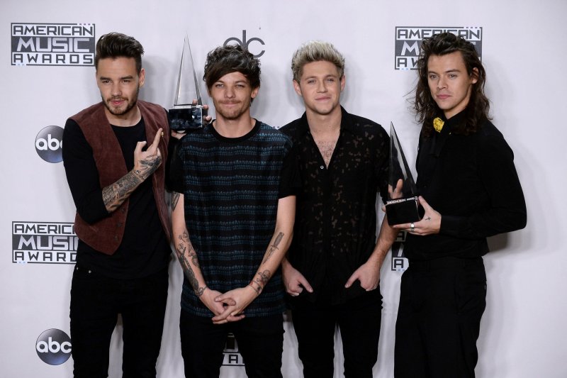 Liam Payne (L) with Louis Tomlinson, Niall Horan and Harry Styles (L-R) of One Direction attend the American Music Awards on November 22, 2015. Payne confessed Thursday that he isn't a fan of Styles' solo single "Sign of the Times." File Photo by Jim Ruymen/UPI