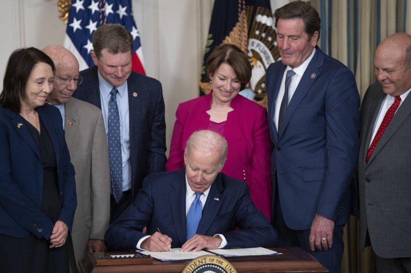 Biden signs ocean shipping reform bill