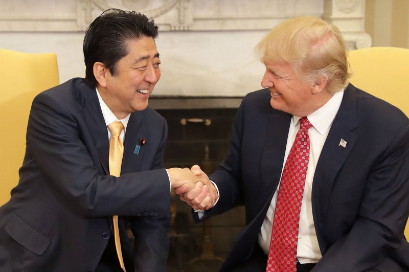 Japanese Prime Minister Shinzo Abe (L) is gaining support for his policies following North Korea’s latest provocations. File Pool Photo by Chip Somodevilla/UPI
