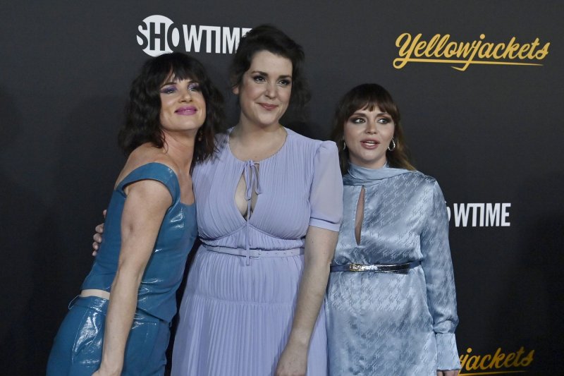 Cast members Juliette Lewis, Melanie Lynskey, Christina Ricci (L-R) attend the premiere of "Yellowjackets" in Los Angeles on November 10, 2021. A trailer for the Showtime series was released ahead of Season 2. File Photo by Jim Ruymen/UPI
