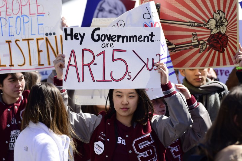 A student of Marjory Stoneman Douglas High School holds a sign Saturday during the March for Our Lives rally in Washington, D.C. Hundreds of thousands rallied in the nation's capital to demand action to end gun violence. Photo by David Tulis/UPI