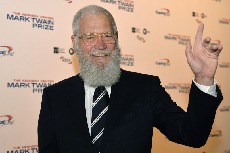 David Letterman greets photographers on the red carpet as he arrives at the John F. Kennedy Center for the Performing Arts for a gala to honor his Mark Twain Prize for American Humor award October 22, 2017, in Washington, D.C. The TV personality turns 75 on April 12. File Photo by Mike Theiler/UPI