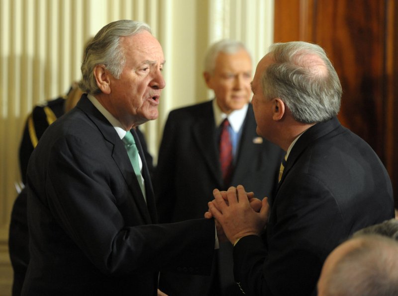 Sen. Tom Harkin, D-IA, greets a guest before U.S. President Barack Obama signs an executive order and presidential memorandum clearing the way for federal funding of stem cell research in the East Room of the White House on March 9, 2009. (UPI Photo/Roger L. Wollenberg)