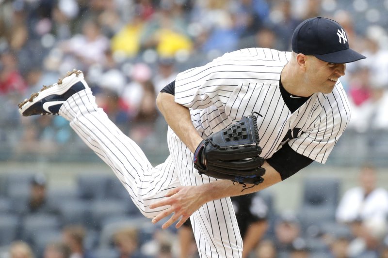 New York Yankees starting pitcher J.A. Happ throws a pitch in the first inning against the Toronto Blue Jays on August 19, 2018 at Yankee Stadium in New York City. Photo by John Angelillo/UPI
