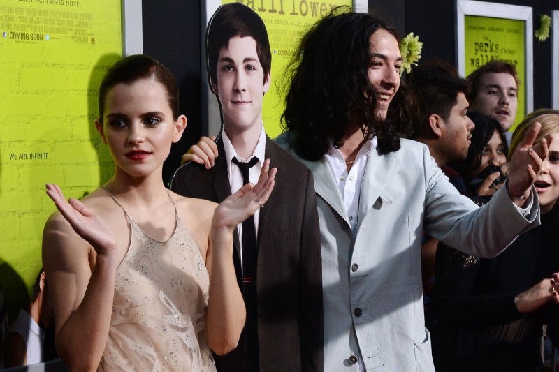 Actress Emma Watson (L) and actor Ezra Miller pose with a cardboard cutout of actor Logan Lerman during the premiere of "The Perks of Being a Wallflower" in Los Angeles on September 10, 2012. File Photo by Jim Ruymen/UPI