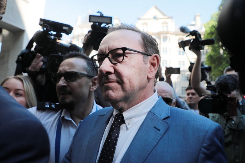 American actor Kevin Spacey arrives at Westminster Magistrates Court in London in June while facing charges of sexual misconduct from three separate men. On Thursday, British law enforcement authorities filed seven new criminal charges against the actor -- including three counts of sexual assault -- in connection with alleged misconduct that occurred between 2001 and 2004. File photo by Hugo Philpott/UPI