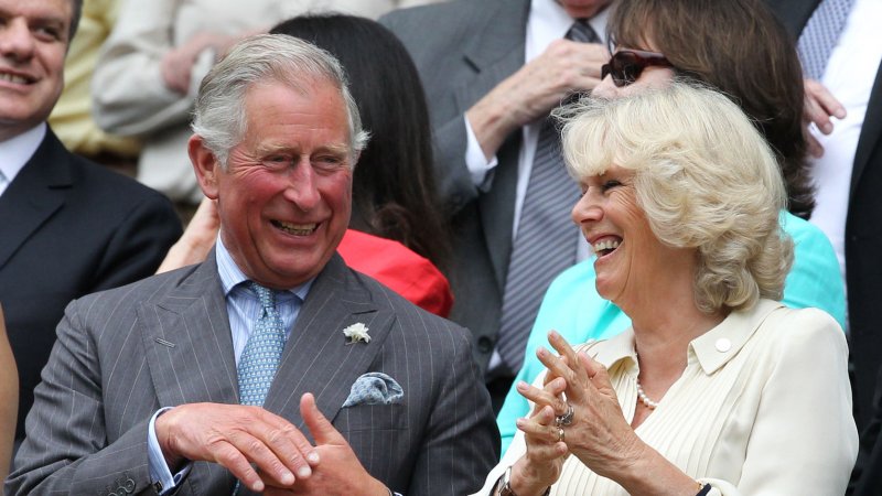 His Royal Highness Prince Charles and his wife Camilla Duchess of Cornwall enjoy tennis in the Royal box. The couple hinted at a royal baby due by the end of the week. UPI/Hugo Philpott