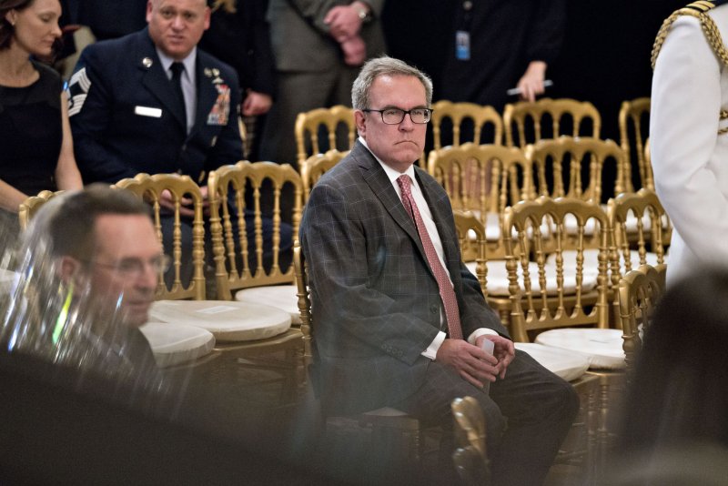 President Donald Trump said he will nominate Andrew Wheeler (C), acting administrator of the Environmental Protection Agency, to lead the agency permanently on Friday. File Photo by Andrew Harrer/UPI | <a href="/News_Photos/lp/058a799fe3692ff9275b8ba61358dea7/" target="_blank">License Photo</a>