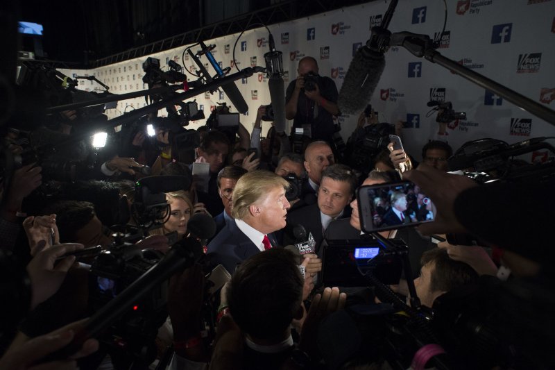 Republican presidential candidate Donal Trump speaks to the media following the first Republican Presidential Debate in Cleveland, Ohio on August 6, 2015. Saturday, his campaign announced that it had fired longtime GOP strategist Roger Stone. Stone, however, said he resigned on his own. Photo by Kevin Dietsch/UPI