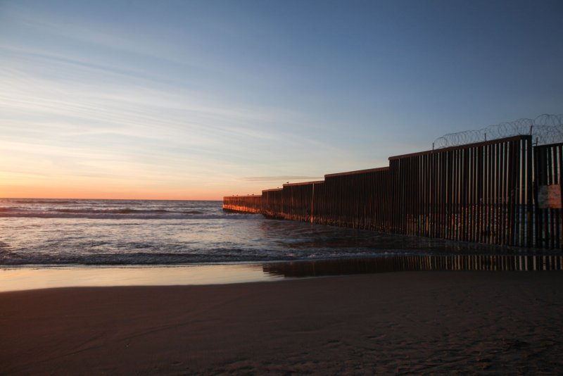 The U.S.-Mexico border fence is seen at Playas de Tijuana on the Pacific coast. The quake late Thursday was centered off the coast near Tijuana, the USGS said. File Photo by Ariana Drehsler/UPI | <a href="/News_Photos/lp/2254e13c576aa28c6d6e4da3a899a840/" target="_blank">License Photo</a>